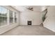 Living room with a fireplace and staircase at 881 Upland Ives Dr, Sugar Hill, GA 30518