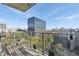 Balcony with outdoor seating showcasing city views and greenery, perfect for relaxation at 788 W Marietta Nw St # 403, Atlanta, GA 30318