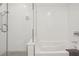 Elegant bathroom featuring a tub with shower and contemporary fixtures at 788 W Marietta Nw St # 403, Atlanta, GA 30318