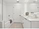 Bathroom features double vanity, sleek fixtures, and glass-enclosed shower at 788 W Marietta Nw St # 403, Atlanta, GA 30318