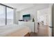 Bright bedroom with large windows, sleek white dresser, and stylish decor at 788 W Marietta Nw St # 403, Atlanta, GA 30318