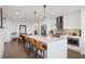 Bright, modern kitchen with a large island, sleek white cabinets, and stainless steel appliances at 788 W Marietta Nw St # 403, Atlanta, GA 30318