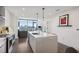 Bright kitchen features stainless steel appliances, a large island with pendant lighting, and an open floor plan at 788 W Marietta Nw St # 403, Atlanta, GA 30318