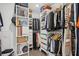 Organized walk-in closet features built-in shelving and ample hanging space for clothes and accessories at 788 W Marietta Nw St # 403, Atlanta, GA 30318