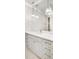 Bathroom featuring vanity with marble countertop and pendant lights at 710 Cox Rd, Roswell, GA 30075