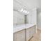 Elegant bathroom with marble countertops, custom cabinets, and a large mirror at 710 Cox Rd, Roswell, GA 30075