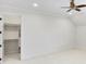 Bedroom with closet featuring custom shelving and drawers at 710 Cox Rd, Roswell, GA 30075