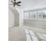 Bedroom with light colored carpet, a ceiling fan, and windows with shutters at 710 Cox Rd, Roswell, GA 30075