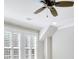 Bedroom with white trim, ceiling fan, and windows with white shutters at 710 Cox Rd, Roswell, GA 30075