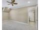 Bedroom with a neutral color palette, plush carpet, and ensuite bathroom at 710 Cox Rd, Roswell, GA 30075
