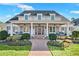 Charming home with inviting front porch featuring swings and a well-maintained garden at 710 Cox Rd, Roswell, GA 30075