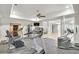 Home gym featuring exercise equipment, a ceiling fan, and french doors at 710 Cox Rd, Roswell, GA 30075