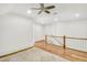 Well-lit hallway features hardwood floors and elegant white trim at 710 Cox Rd, Roswell, GA 30075