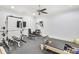 This home gym boasts free weights, a pilates machine, and two wall mounted TVs at 710 Cox Rd, Roswell, GA 30075