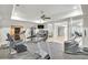 Spacious home gym featuring modern exercise equipment and a ceiling fan at 710 Cox Rd, Roswell, GA 30075