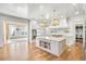 Gourmet kitchen with a large island, stainless steel appliances, and pendant lighting at 710 Cox Rd, Roswell, GA 30075
