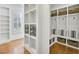 Mudroom complete with built-in shelving, storage baskets, and bench seating at 710 Cox Rd, Roswell, GA 30075