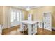 Bright office featuring neutral colors, storage, French doors, and hardwood flooring at 710 Cox Rd, Roswell, GA 30075