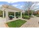 Beautiful pergola with stylish outdoor seating, creating a perfect spot for relaxation and entertaining at 710 Cox Rd, Roswell, GA 30075