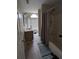 Bathroom featuring shower and bath combo, vanity, and natural light at 405 Baneberry Bnd, Peachtree City, GA 30269