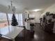 Eat-in kitchen featuring white cabinets, stainless steel appliances, and granite countertops at 405 Baneberry Bnd, Peachtree City, GA 30269