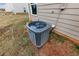 Backyard view of an air conditioning unit at 527 Firethorn Ct, Villa Rica, GA 30180