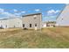 View of home's back and side yards at 527 Firethorn Ct, Villa Rica, GA 30180