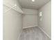 Large walk-in closet with wire shelving at 527 Firethorn Ct, Villa Rica, GA 30180