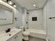 Updated bathroom with marble shower and vanity at 1695 Bull Sw Run, Lilburn, GA 30047