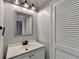 Clean bathroom featuring a new vanity and mirror at 1695 Bull Sw Run, Lilburn, GA 30047