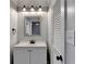 Small bathroom with updated vanity and fixtures at 1695 Bull Sw Run, Lilburn, GA 30047