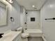 Modern bathroom, marble shower, and stylish fixtures at 1695 Bull Sw Run, Lilburn, GA 30047