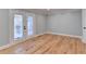 Bright bedroom with hardwood floors and French doors at 1695 Bull Sw Run, Lilburn, GA 30047