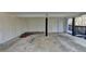 Covered patio with concrete flooring and wooded views at 1695 Bull Sw Run, Lilburn, GA 30047