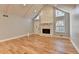 Spacious living room with hardwood floors, fireplace and vaulted ceiling at 1695 Bull Sw Run, Lilburn, GA 30047