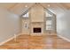 Spacious living room with hardwood floors, fireplace and vaulted ceiling at 1695 Bull Sw Run, Lilburn, GA 30047