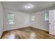 Bright bedroom with hardwood floors and windows at 131 Brookwood Sw Dr, Marietta, GA 30064