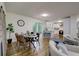 Open concept dining area with hardwood floors and view of kitchen and living room at 131 Brookwood Sw Dr, Marietta, GA 30064