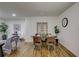 Bright dining area with hardwood floors, a stylish table, and decorative wall accents at 131 Brookwood Sw Dr, Marietta, GA 30064