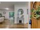 Bright entryway with hardwood floors, console table, and view into living area at 131 Brookwood Sw Dr, Marietta, GA 30064