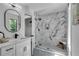 Modern bathroom with marble shower and a floating vanity at 3483 Winter Chase Dr, Marietta, GA 30062