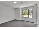 Simple bedroom with gray carpet and large window at 3483 Winter Chase Dr, Marietta, GA 30062