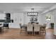 Modern dining room with a large table and access to the kitchen at 3483 Winter Chase Dr, Marietta, GA 30062