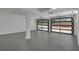 Spacious two-car garage with grey epoxy floor and glass garage doors at 3483 Winter Chase Dr, Marietta, GA 30062