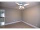 Spacious bedroom with ceiling fan, neutral walls at 1444 Tether Ln, Mcdonough, GA 30253