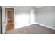 Bright bedroom with carpeting and walk-in closet at 1444 Tether Ln, Mcdonough, GA 30253