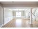 Bright dining room with hardwood floors and chandelier at 1444 Tether Ln, Mcdonough, GA 30253