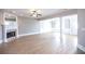 Spacious living room with fireplace and hardwood floors at 1444 Tether Ln, Mcdonough, GA 30253