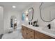 Elegant bathroom with double vanity, marble floors, and large mirrors at 2873 Bob Bettis Rd, Marietta, GA 30066