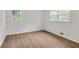 Bright bedroom with new flooring and large windows at 2873 Bob Bettis Rd, Marietta, GA 30066